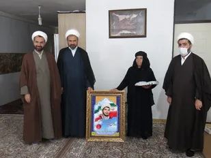 بازدید مسئولین کرمانشاه از خانواده شهید چقازردی