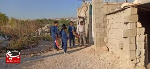 توزیع بسته&zwnj;های معیشتی توسط دانش آموزان دبستان تلاش