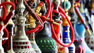 عرضه بدون مجوز  قلیان با "در" مخفی!