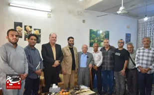 تجلیل مشاور وزیر فرهنگ و ارشاد اسلامی از خبرنگار بسیج اندیمشک