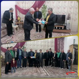 از خانواده شهید حسن ایل سعادتمند در شهر قنوات تجلیل شد