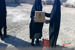 توزیع ۳۲ بسته مواد غذایی در بین نیازمندان هیرمندی