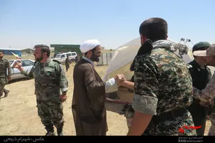 بازدید مسئول نمایندگی ولی فقیه در سپاه ملایر از محل رزمایش بسیجیان