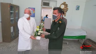 تجلیل از کادر درمان مرکز بهداشتی درمانی شهر حسن آباد جرقویه علیا