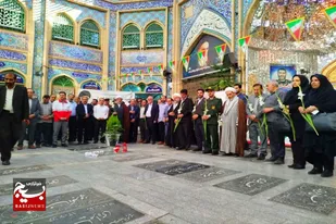 آیین غبارروبی و گلباران مزار مطهر شهدای نهاوند به مناسبت هفته دفاع مقدس