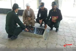 عطرافشانی و غبارروبی گلزار شهدای فامنین