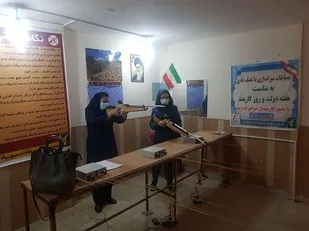 برگزاری مسابقات تیراندازی خواهران بسیجی ادارات استان به مناسبت هفته دولت و روز کارمند
