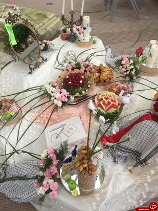 سفره عقدی که در کنار مزار مطهر شهدای گمنام پهن شد