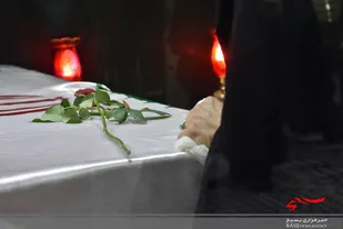 غبار روبی و عطر افشانی مزار شهید گمنام  در بیت الزهرا کرمان