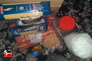 تهیه بسته&zwnj;های معیشتی برای خانواده&zwnj;های نیازمند به همت بسیجیان روستای گاوسوار