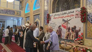 تجلیل از ۱۵۰ رزمنده و یادگار دفاع مقدس در شهرستان سیریک