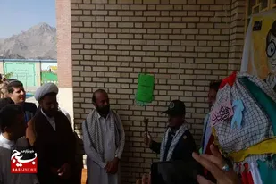 نواختن زنگ ایثار و مقاومت در شهرستان فنوج